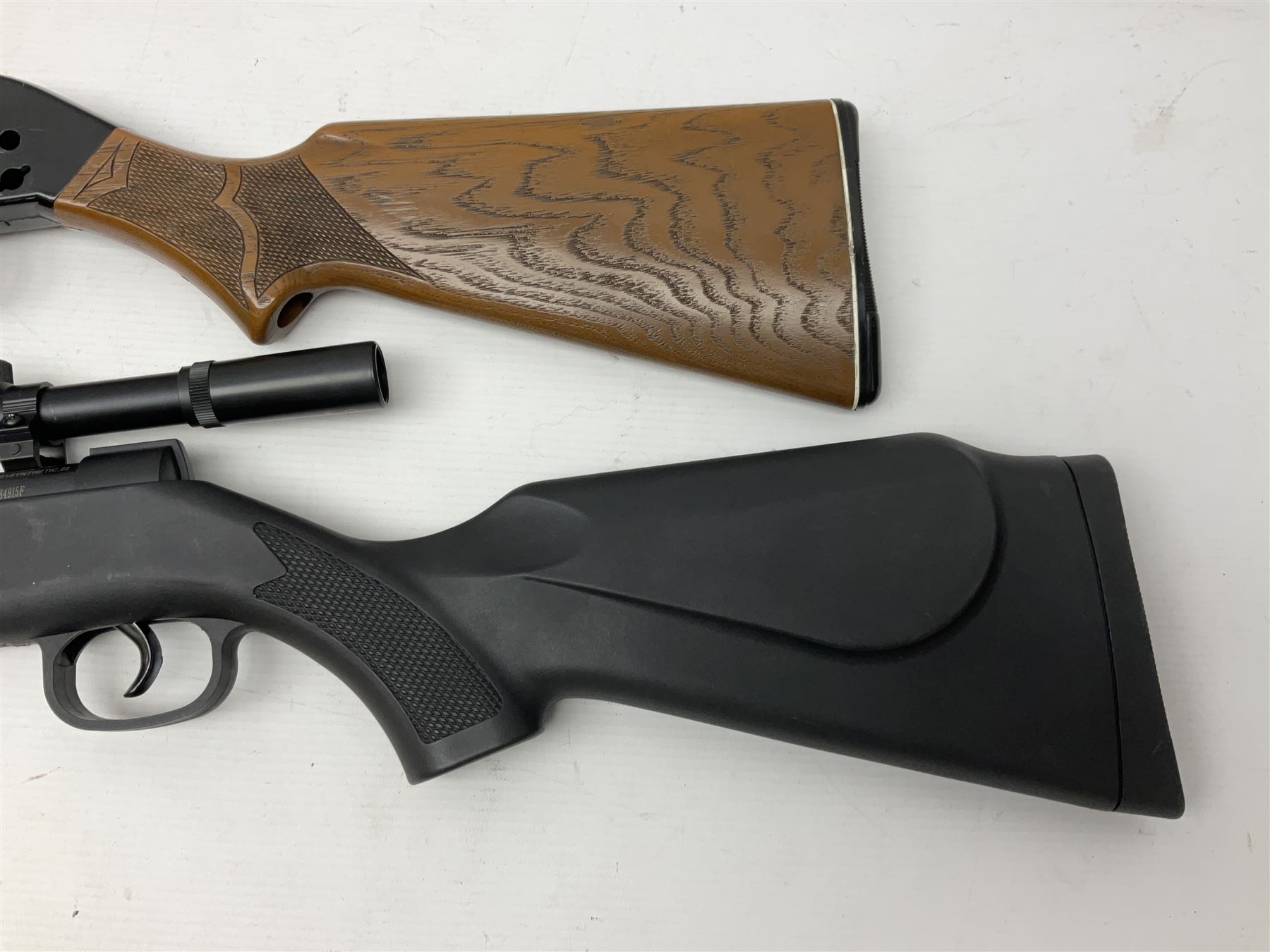 Crosman 760 .177 cal. Junior air rifle with under lever faux pump action and simulated wooden fittings; serial no.278047476, L90cm overall; and SMK B1 Synthetic .22 cal. Youth's air rifle with break-barrel action and 4 x 20 scope; serial no.1721229956084915F, L98.5cm overall (2)  NB: AGE RESTRICTIONS APPLY TO THE PURCHASE OF AIR WEAPONS.