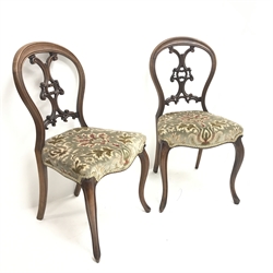 Pair Victorian walnut bedroom chairs with pierced and carved balloon backs, upholstered serpentine seat, cabriole legs, W48cm