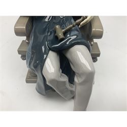 Lladro figure, Justice, modelled as a judge sat in a char, sculpted by Salvador Furió, with original box, no 5489, year issued 1988, year retired 1993, H34cm 