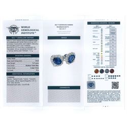 Pair of 18ct white gold oval tanzanite, baguette and round brilliant cut diamond cluster stud earrings, total tanzanite weight 7.37 carat, total diamond weight 2.01 carat, with World Gemological Report