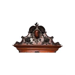 Late 19th century mahogany mirror back cabinet, shaped C-scroll pediment decorated with carved acanthus leaf cartouche and shells, shaped canopy top with applied foliate carvings over triple bevelled mirror back, central cupboard enclosed by panelled door carved with musical instruments, scrolls and shells, flanked by two glazed cabinets, on acanthus leaf carved cabriole supports united by undertier 