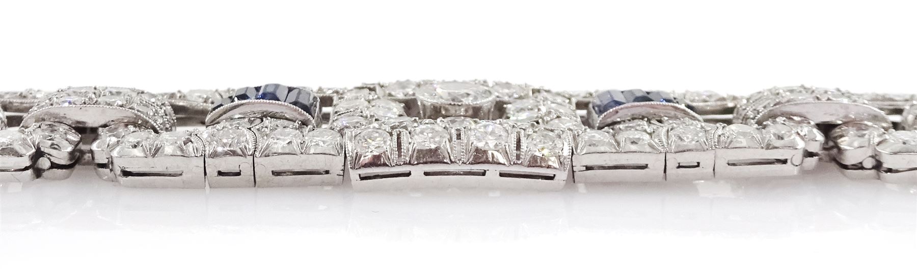 Art Deco platinum milgrain set old cut diamond and calibre cut Burmese sapphire link bracelet, the three principal diamonds each approx 0.50 carat, total diamond weight approx 13.00 - 14.00 carat, stamped Pt, circa 1925, in fitted box by Licht & Morrison, London