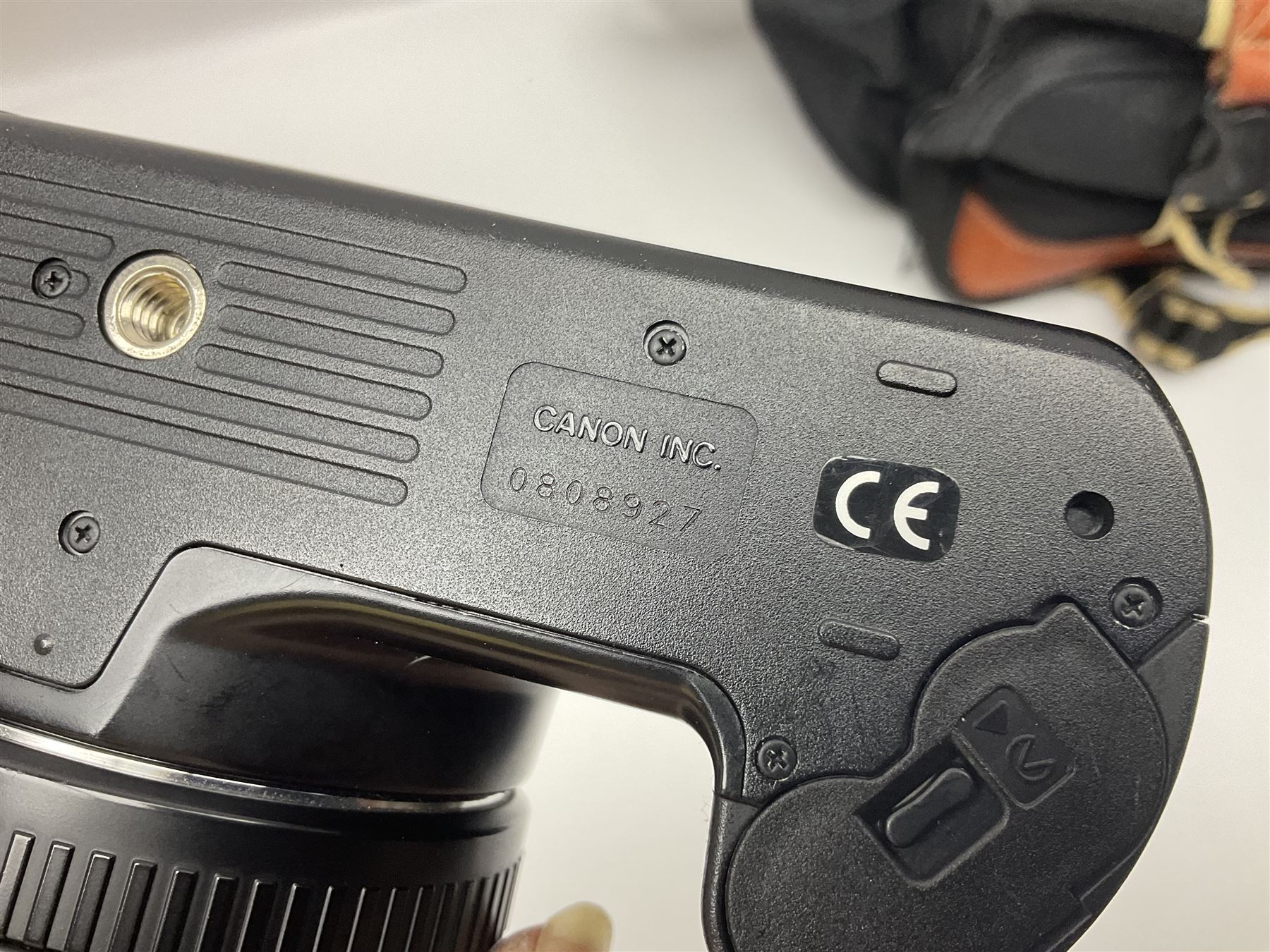 Four camera bodies, to include, Ricoh KR-10 serial no. 38826, Pentax MZ-M serial no. 4185969 with 'SMC Pentax- M 1:3.5 28mm' lens, Canon EOS500 serial no. 080927, with 'Sigma Zoom 100-300mm 1:4.5-6.7 DL'  lens etc, with other camera lenses and equipment 