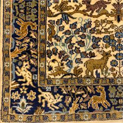 Bokhara rug, earthy ground, with repeating gul motifs, Persian pictorial rug on ivory ground with a densely patterned tree-of-life motif and symmetrically arranged deer, birds, and  other wildlife, 182x149cm & 152x90cm, (2)