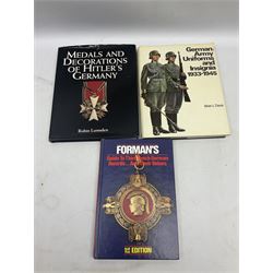 Ten books of German medal interest including Robin Lumsden: Medals and Decorations of Hitler's Germany; Forman's Guide to Third Reich German Awards ... and Their Values. Signed by the author; Christopher Ailsby: Combat Medals of The Third Reich; Gordon Williamson: The Iron Cross A History 1813-1957 and Knights of the Iron Cross A History 1939-1945; and five others (10)