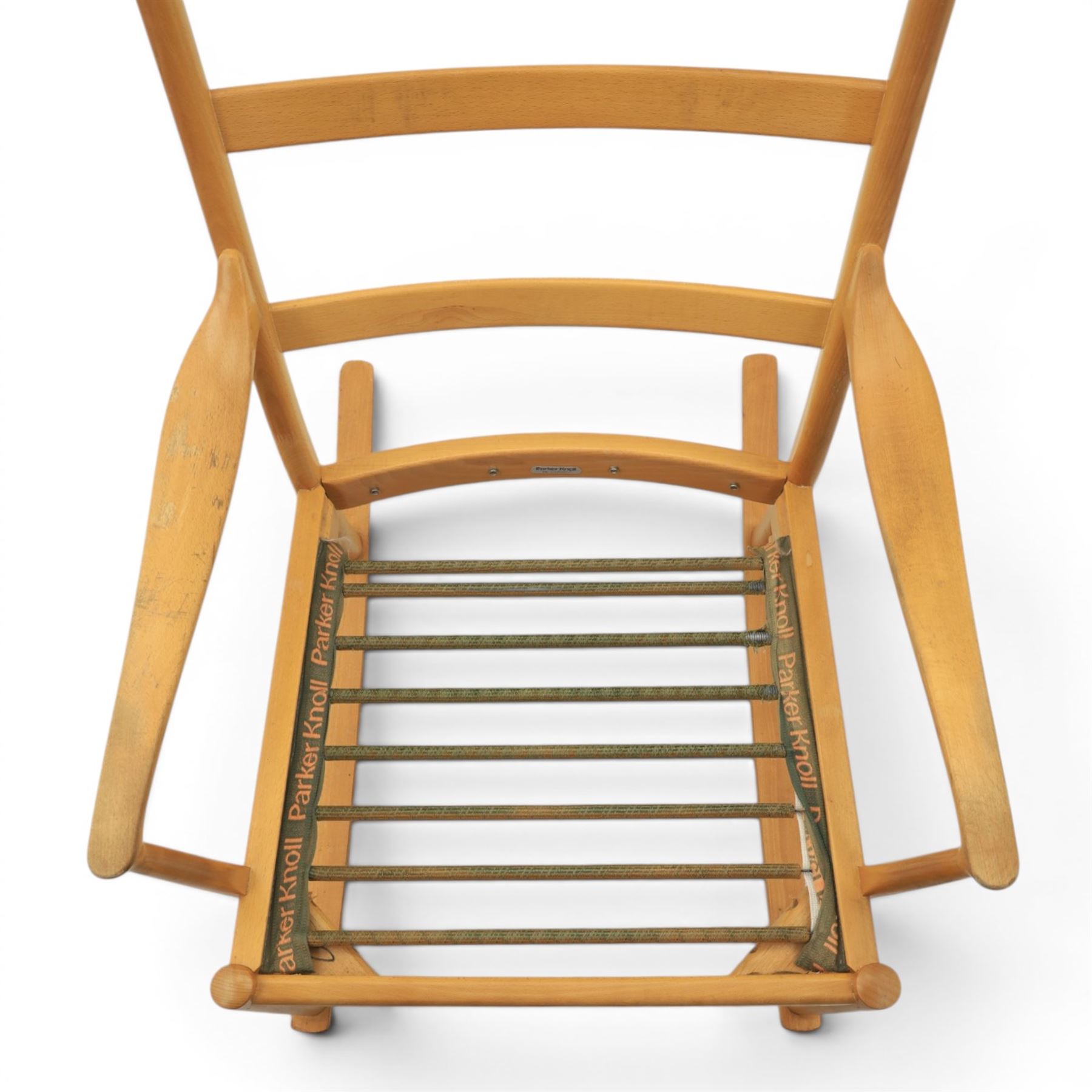 Parker Knoll -model '480' rocking beechwood chair, loose seat cushions above an elasticated webbing seat, curved rocker base 