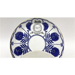 Late 19th century Coalport porcelain cup and saucer in the 'Aster' pattern bearing the crest of Express Dairy Company Limited, College Farm, Finchley and decorated with a steam locomotive