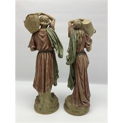 Pair of Royal Dux figures, the watercarrier and the fruit carrier, no 884 and 885, with red triangle and number beneath, tallest H44.5cm