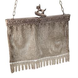 Gold shirt stud, stamped 18ct, silver lidded circular box, hallmarked, base metal purse, two gilt shirt studs, brooch and blacksmith's anvil and hammer