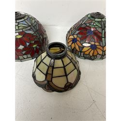 Three Tiffany style lamp shades, each with multicoloured floral decoration, largest D20.5cm
