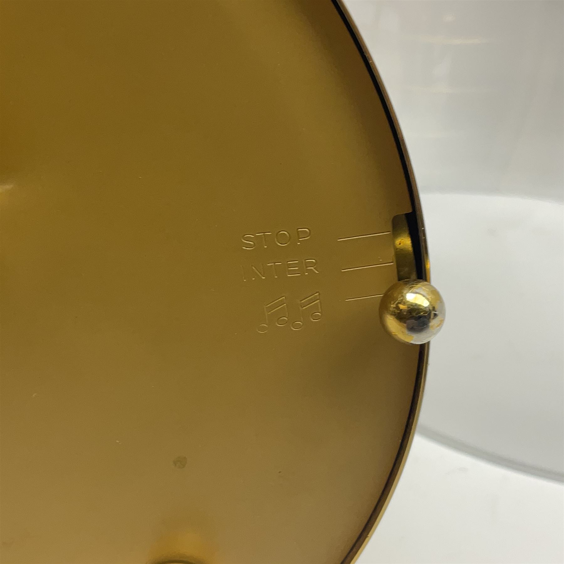 Swiss Reuge Music bird cage automaton music box, the bird with articulated head and beak, in a gilt brass cage, with a glass dome and stand, H30cm