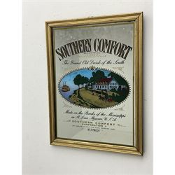 Southern Comfort advertising mirror, together with Newcastle Brown Ale advertising mirror, largest H50cm, L65cm