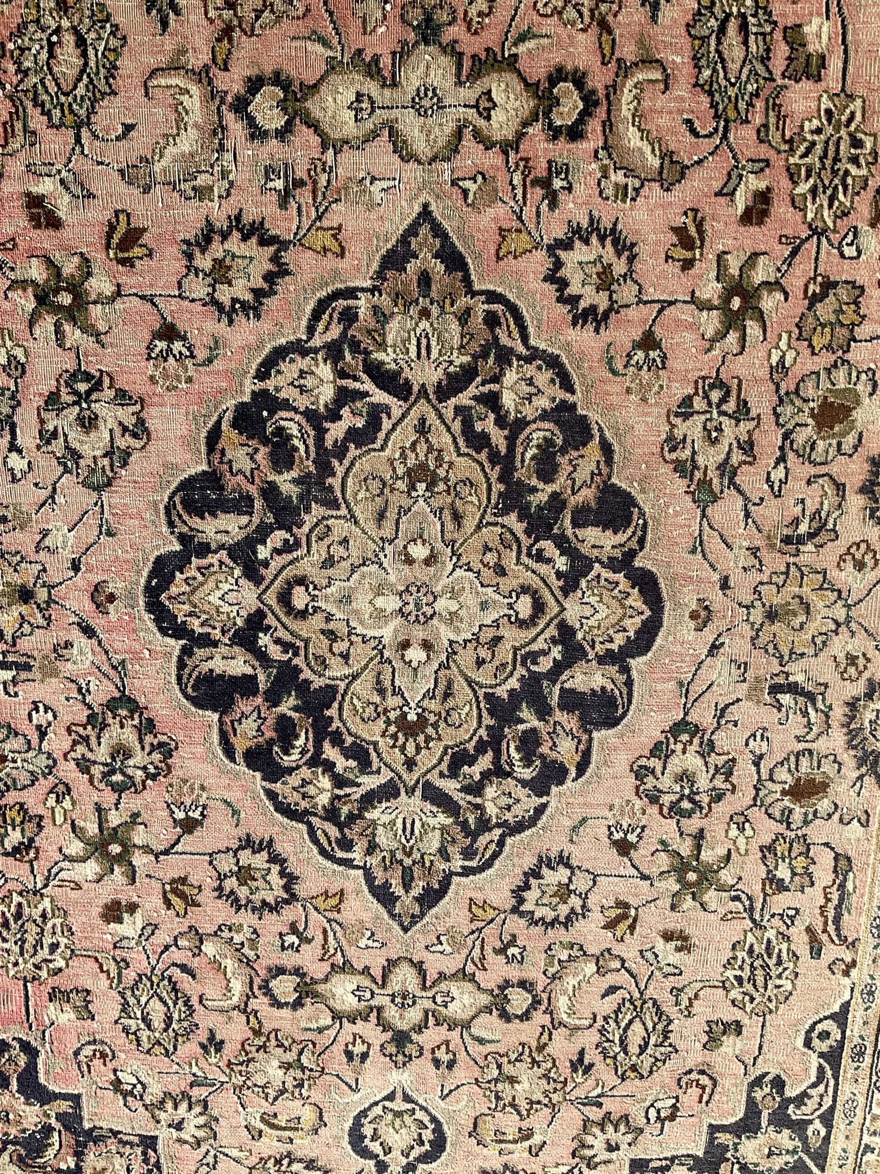 Persian Kashan carpet, blue shaped medallions and spandrels, the field