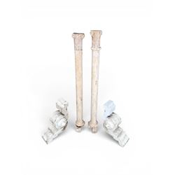 Pair of 19th century stripped pine columns  with carved capitols; an a pair of painted scroll architectural capitols (4)