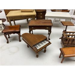 Doll's house wooden furniture - over twenty items including good quality pine Welsh dresser by Tony of Lincoln; tall 'glazed' bookcase; two-tier side cabinet; grand piano; bedside chest, mule chest, Canterbury; cradle; Georgian style hanging corner cupboard; dumb waiter; tables; chairs; rocking chair etc; various scales