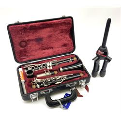Yamaha 26II five-piece clarinet, cased, together with stand 