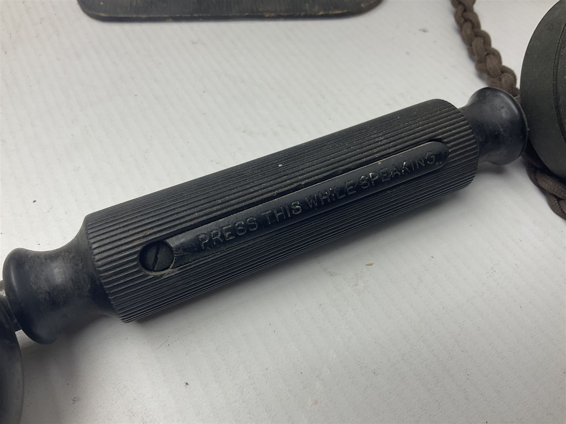 Collection of phone headsets, including GPO bakelite examples, together with other telephone parts 