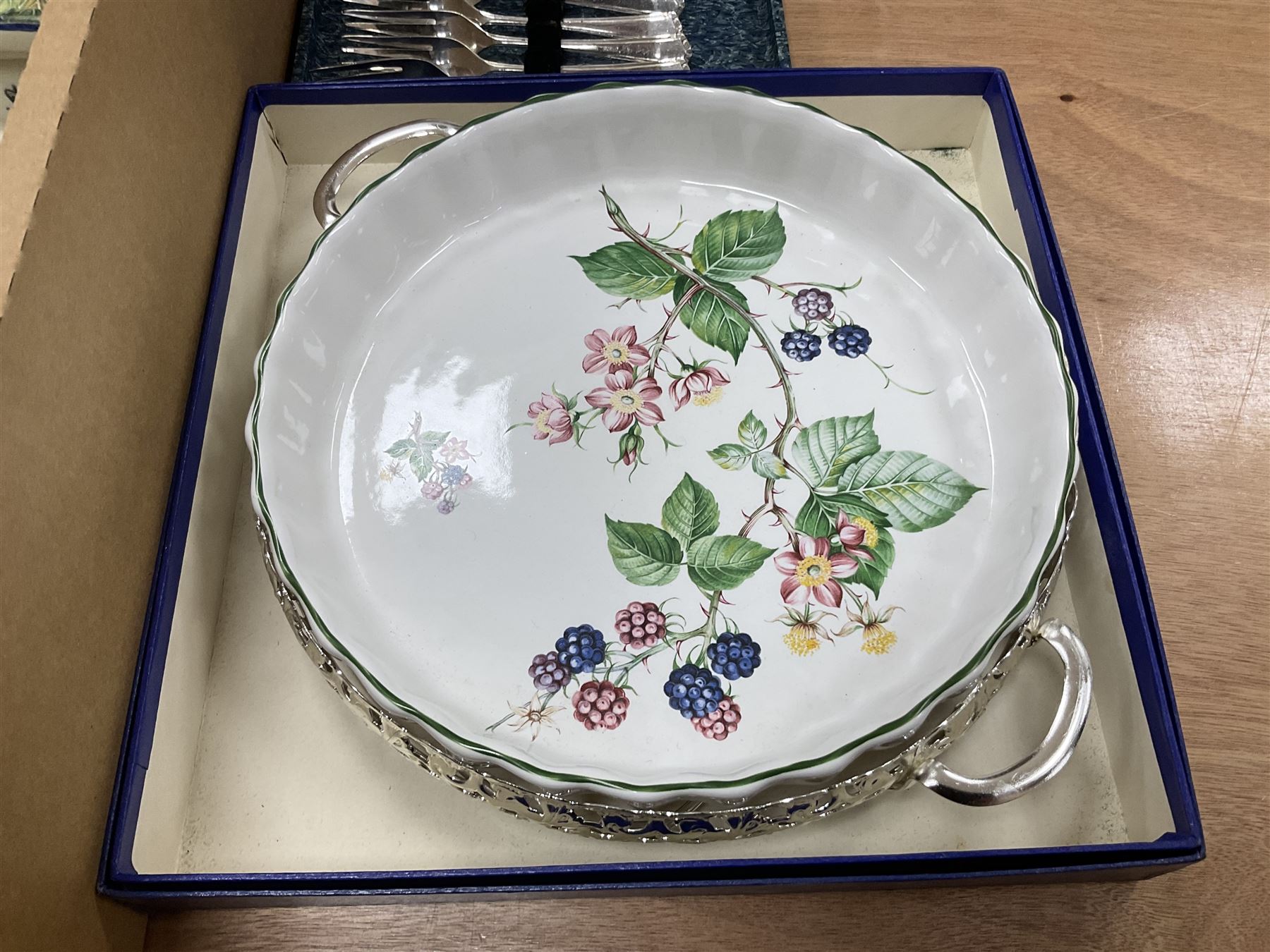 Old Tupton Ware floral decorated mantle clock, Wade Festival jug, Winsor tea wares and other ceramics, together with a collection of silver plate including blue glass lined salts, cutlery sets etc, two boxes 