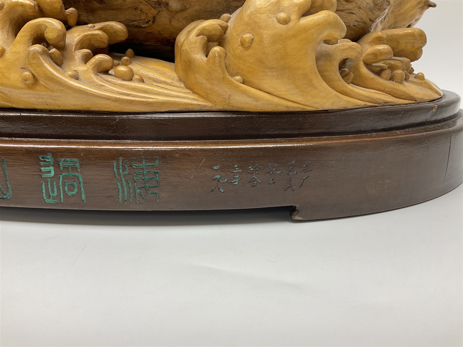 Large Chinese wood carving, depicting the eight immortals crossing the sea, H46cm, L78cm 