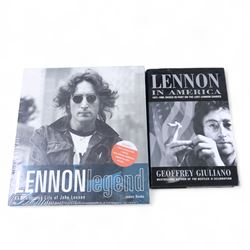 The Beatles memorabilia, including 1964 Fan Club patch, framed with a black and white picture of the band, a further framed black and white picture displayed with Strawberry Fields Forever single, The Beatles Anthology, biographies and other books, two CDs, mug, etc