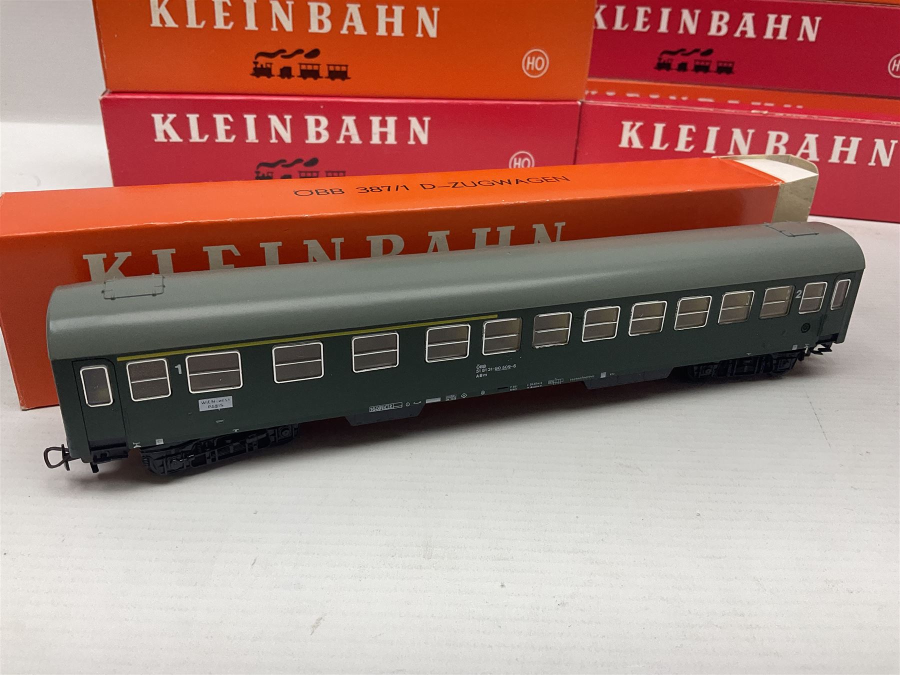 Kleinbahn HO gauge - thirteen passenger coaches - five 398 2.Klasse Eurofima Reisezugwagen; four OBB 387/1 D-Zugwagen; two 385 Schlafwagen; and two 370 Personenwagen 2 achsig; all boxed (13)