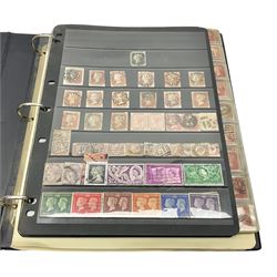 Queen Victoria and later stamps including imperf penny reds, King George V seahorses, some facsimile stamps, Queen Elizabeth II used postage stamps etc, housed in a green ring binder folder 