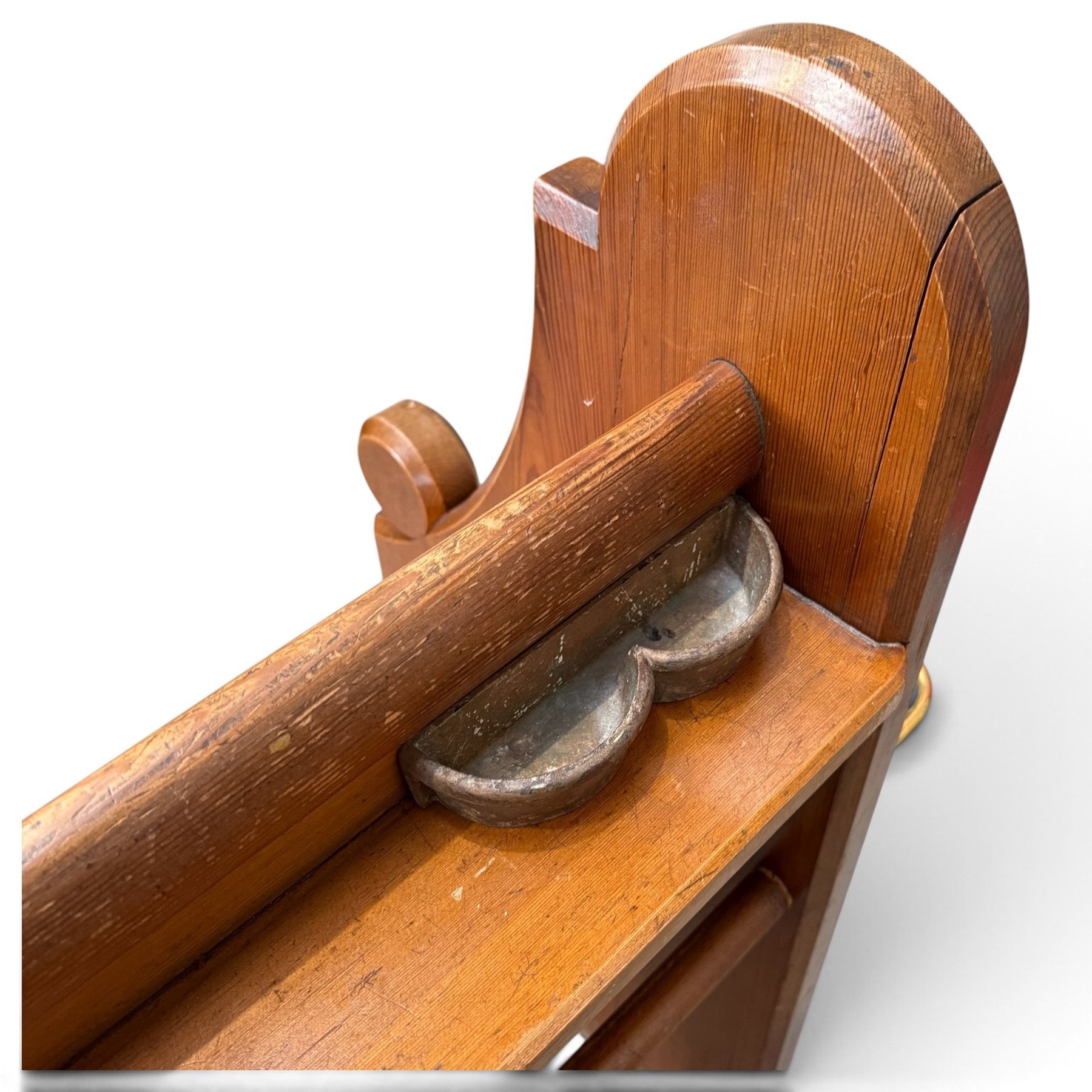 Early 20th century stained pine ecclesiastical church pew, the shaped end supports flanking slatted and panelled back, with black stencilled number '16' to the side