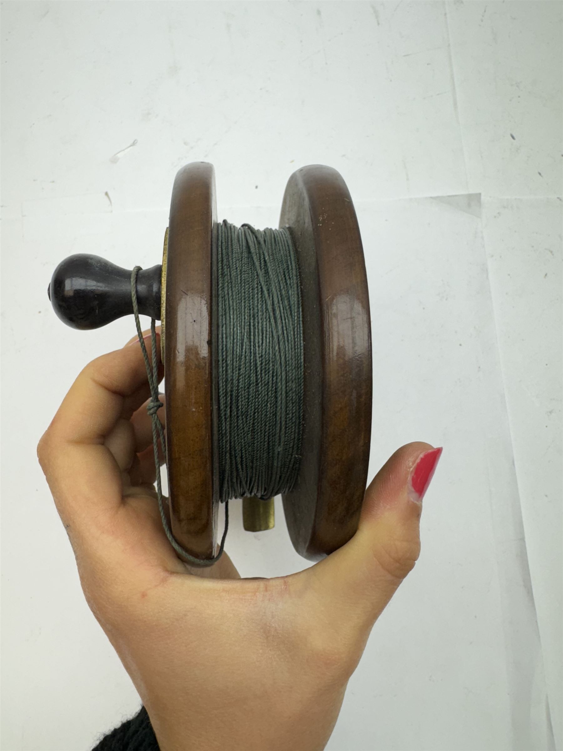 D. Slater, Newark, wood, alloy and brass star-back centre pin reel,  together with three other wooden/alloy reels including Edge Elite, Milbro Pelican and one other 