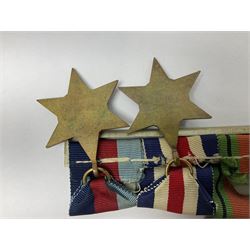 WW2 group of five medals comprising 1939-1945 War Medal, Defence Medal, 1939-1945 Star, France and Germany Star and Canadian Volunteer Service Medal; on wearing bar with ribbons; with a medal box and slip and three photographs