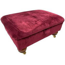 Duresta - traditional shape armchair upholstered in burgundy red velvet, on square tapering front supports (W88cm, H85cm, D103cm); together with a matching rectangular footstool with hinged seat, on turned feet with brass castors (73cm x 54cm, H38cm)