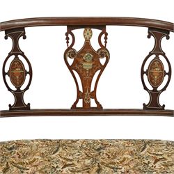 Edwardian marquetry inlaid mahogany salon settee, with bowed top rail and pierced splat back featuring central classical urn flanked by oval floral medallions, floral upholstered seat on boxwood strung square tapering legs terminating in spade feet