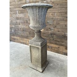 Large Georgian design cast stone garden centre-piece urn, egg and dart border, tapering column on square base, raised on square column