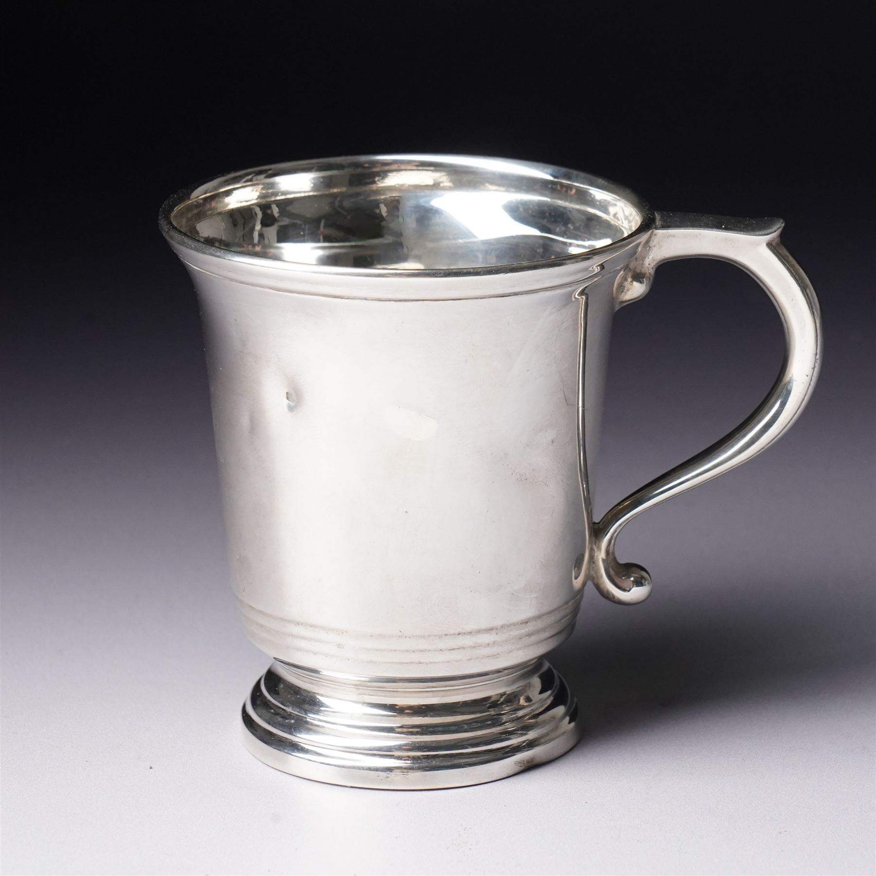 Silver christening mug  with loop handle engraved with initials H8cm Birmingham 1937 Maker possibly Roberts & Dore