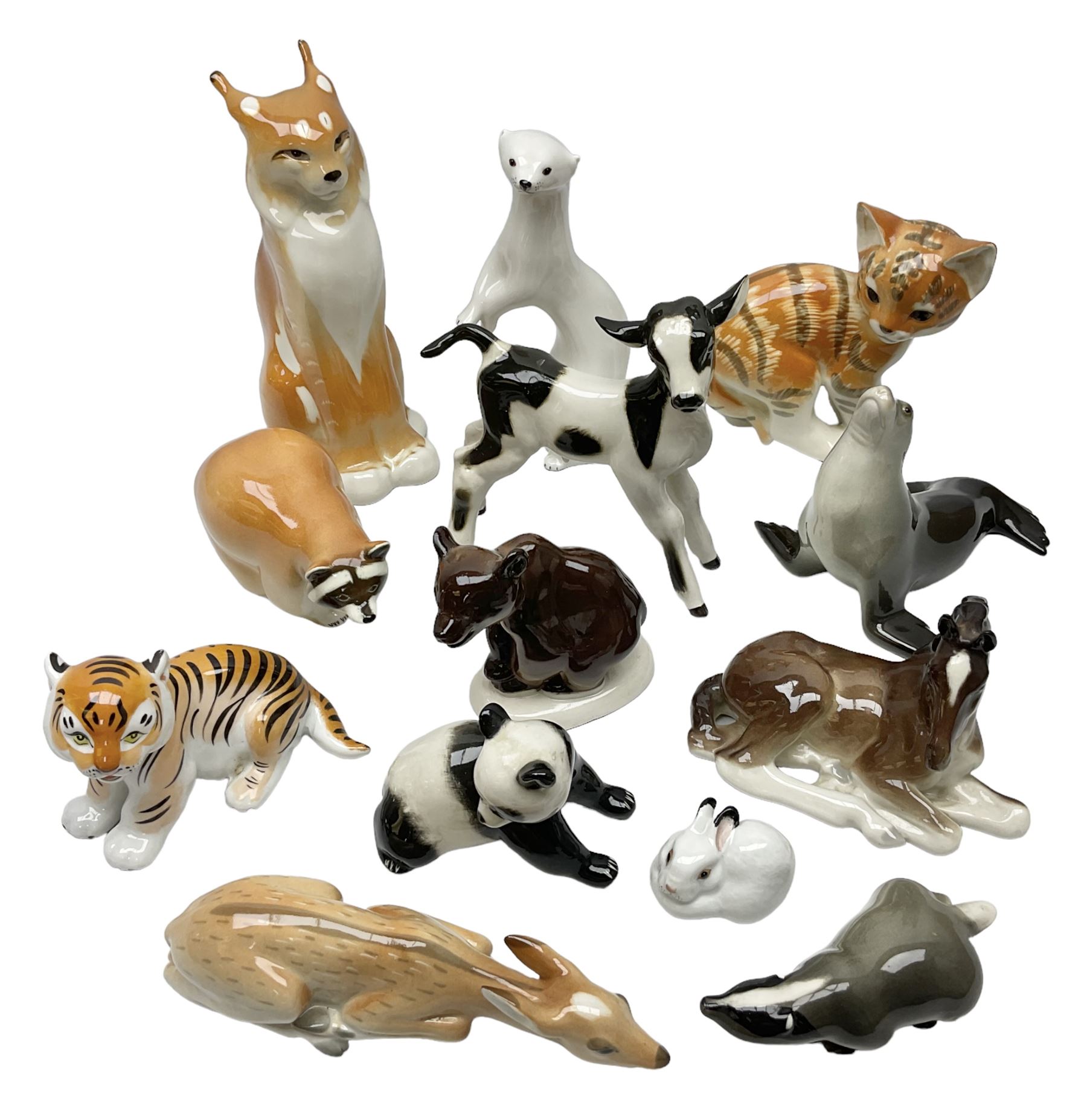 Collection of Russian Lomonosov USSR animal figures, to include  lynx, tiger, red panda, sealion, panada, etc 