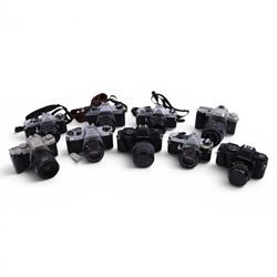 Nine Pentax cameras, including MX, MZ-5, ME Super, P30, etc all with lenses