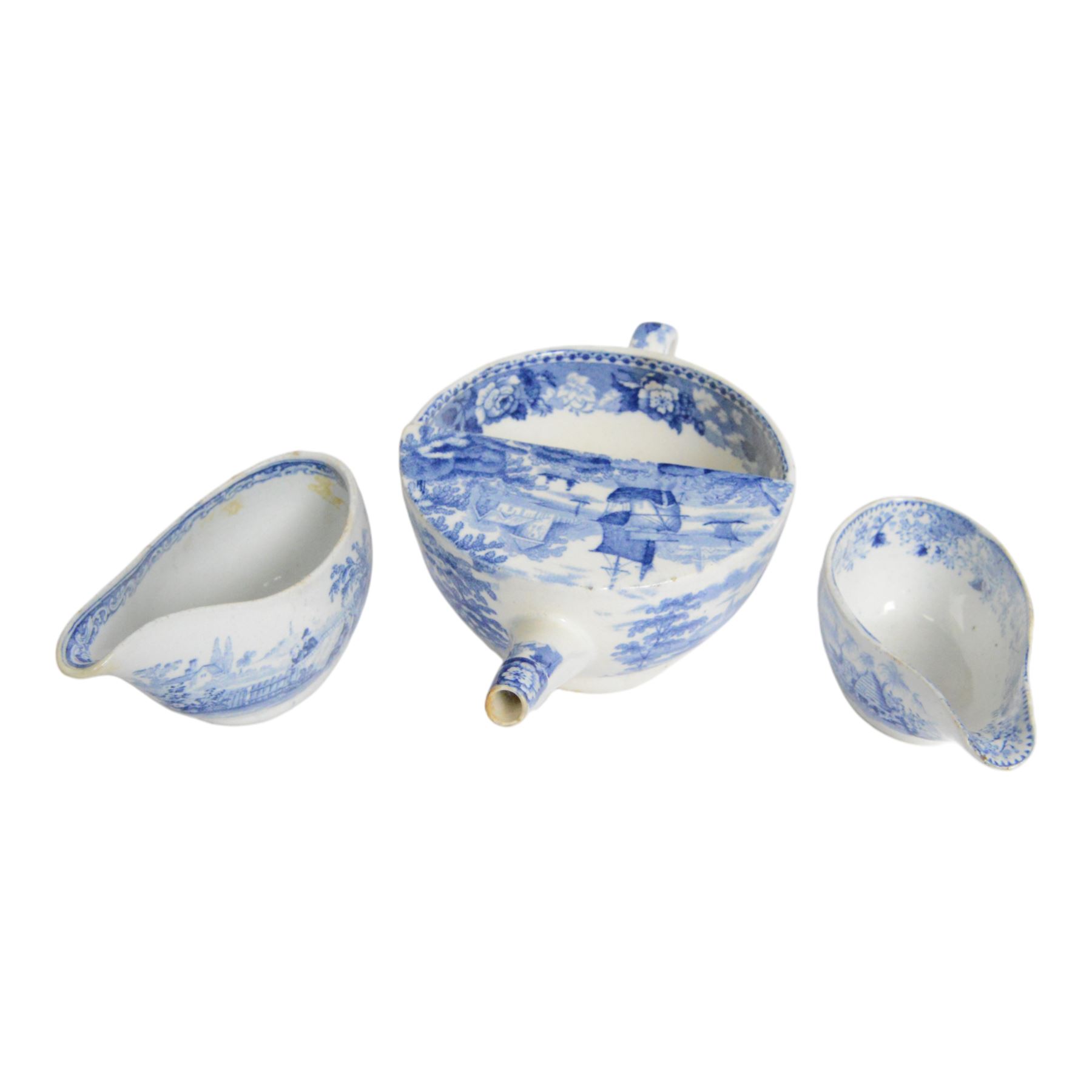 Two early 19th century blue and white transfer printed pap boats, the first example decorated in the Beehive pattern, by William Ridgeway & Co or William Adams, L10cm, the second decorated in one of the Hymphrey's Clock series patterns by William Ridgeway, L11.5cm, together with an early 19th century blue and white transfer printed invalid feeder, L17.5cm