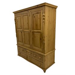 Solid pine large triple wardrobe, with five base drawers