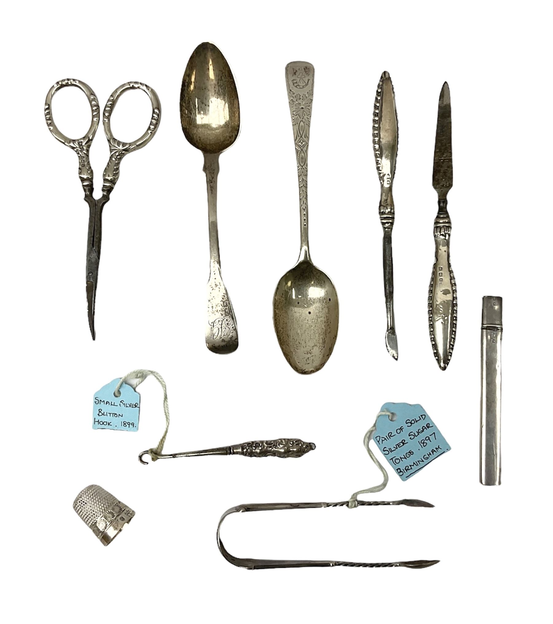 Small group of silver, to include Georgian Fiddle pattern teaspoon, later teaspoon, sugar tongs, etc., all hallmarked, approximate weighable silver 59 grams, approximate gross weight 113 grams