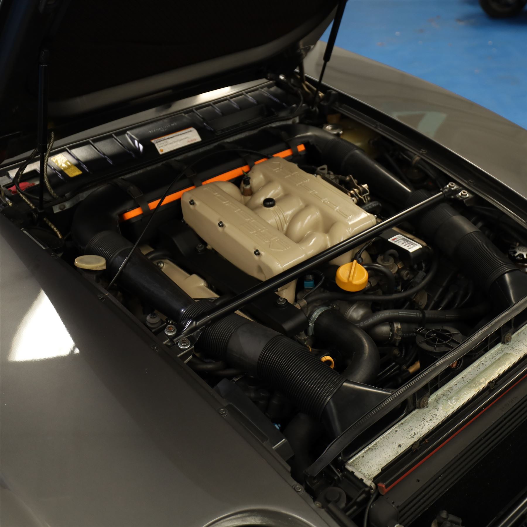 1991 Porsche 928 S4 Automatic Coupé

Registration: L644 LBE
Date of first registration as shown on V5: 1 July 1994
Porsche year of manufacture: 1991
Engine: 5.0-litre V8 petrol
Transmission: Automatic
Odometer reading: 37,886 kilometres (approximately 23,541 miles)
Colour: Slate Grey metallic
Interior: Black leather
V5C: Present
Keys: One
Chassis number: WP0ZZZ92ZMS800460

An exceptional Porsche 928 S4 Automatic Coupé finished in Slate Grey metallic with a black leather interior. The car displays a notably low odometer reading of just 37,886 kilometres, equivalent to approximately 23,541 miles.

The 928 S4 combined Porsche’s powerful 5.0-litre V8 engine with a sophisticated rear-mounted transaxle, creating a refined and accomplished grand tourer. This example is equipped with automatic transmission, electrically adjustable front seats, air conditioning, alloy wheels and the characteristic rear spoiler.

The car was purchased from Specialist Cars of Malton in June 2019, at which time the recorded mileage was 36,650 kilometres. The accompanying service record includes evidence of a cam belt replacement.

Presented in excellent condition throughout, the bodywork and metallic paint finish appear particularly well preserved, while the cabin retains its original character with black leather upholstery and 928-branded sill trims. A Japanese Porsche service label records maintenance entries at 31,902, 33,397 and 34,134 kilometres.

The car also features a Porsche Classic Communications Management (PCCM) upgrade system.

Features

• 5.0-litre V8 petrol engine
• Automatic transmission
• Slate Grey metallic paintwork
• Black leather interior
• Electrically adjustable front seats
• Air conditioning
• Porsche alloy wheels
• Rear spoiler
• Right-hand drive
• Odometer reading of 37,886 kilometres, approximately 23,541 miles
• Purchased from Specialist Cars of Malton in June 2019
• Recorded at 36,650 kilometres when purchased
• Service record showing cam belt replacement
• Japanese Porsche service label
• V5C present
• One key

This vehicle forms part of the Estate of the Late John Sils and is offered for sale by the Executors, confirming a genuine reason for sale.