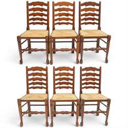 Set of six Lancashire country ladderback dining chairs with rush seats, raised on tapering...