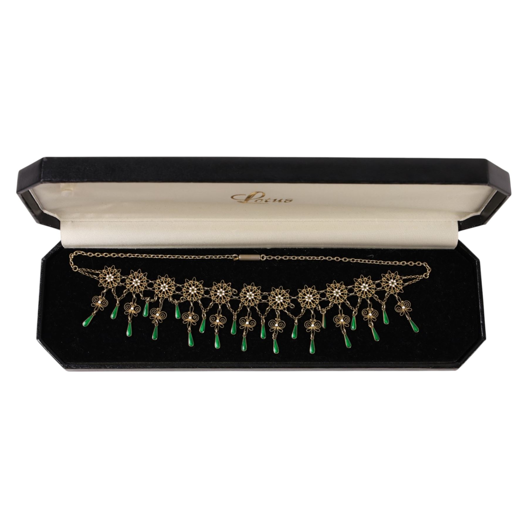 Silver-gilt filigree enamel necklace, silver stone set brooch by Charles Horner, silver marcasite brooch and a gold plated stone set hair work brooch