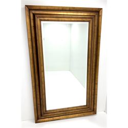 Large rectangular swept gilt framed bevel edge mirror 