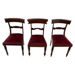 Seven early 19th century mahogany dining chairs - set six side chairs with scroll carved middle rails (W46cm), and a carver elbow chair with rope twist middle rail