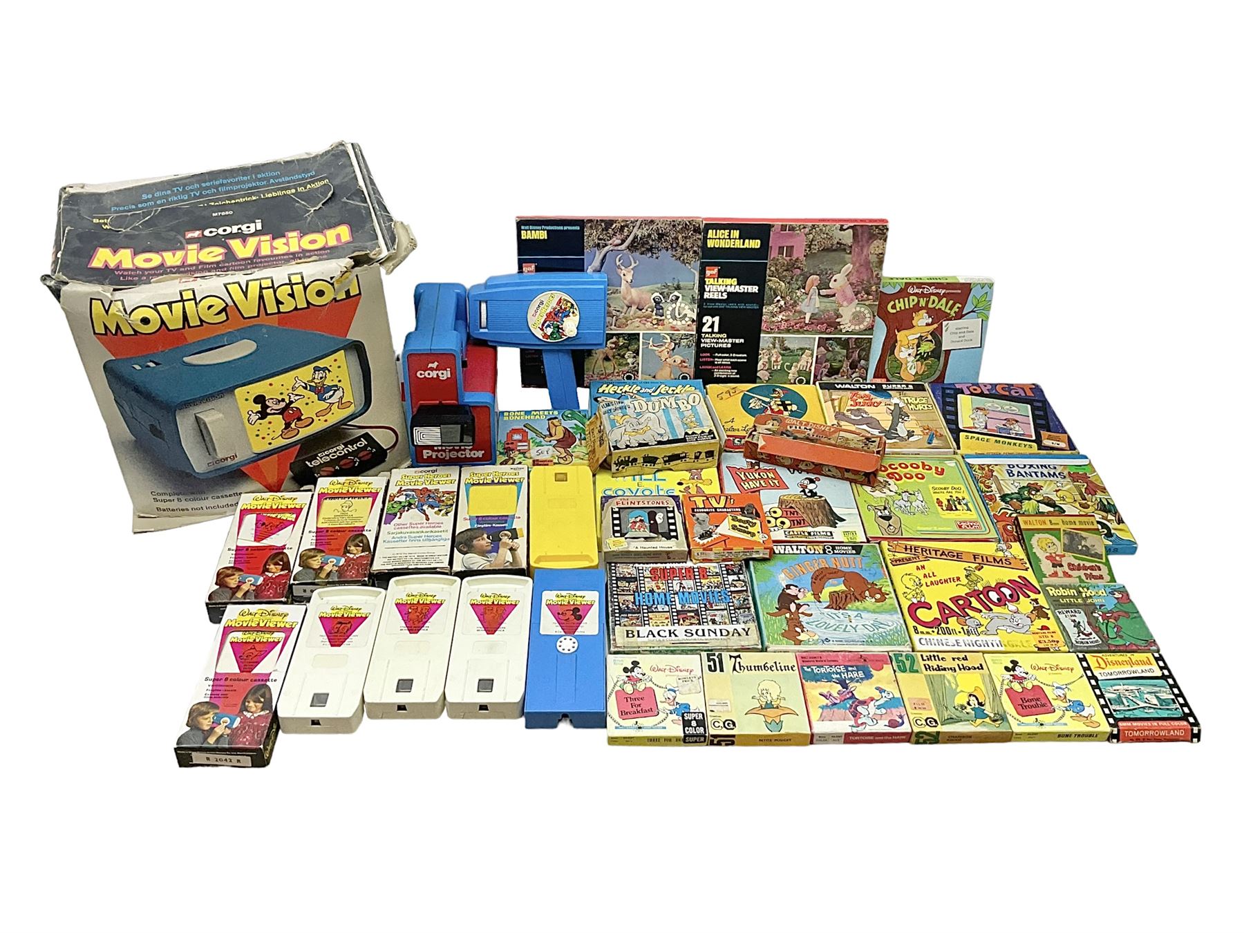 Corgi/Disney - Movie Vision, in original box, with Corgi projector, two Corgi Movie Viewers and nine films; together with 8mm film reels and strips to include Disney’s Dumbo, Mickey Mouse, Alice in Wonderland etc, most in original boxes