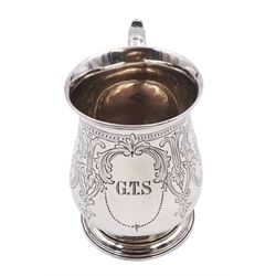 Victorian silver christening mug, of waisted form with scroll handle, bright cut rose and scroll decoration and engraved initials to body, upon spreading circular stepped foot, hallmarked A B Savory & Sons, London 1864, including handle H9.7cm, approximate total weight 6.44 ozt (200.4 grams)