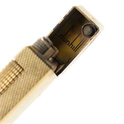 Dunhill - Rollagas lighter, gilt metal with engine-turned decoration and ribbed thumbpiece, H6.5cm 