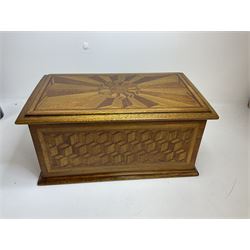 19th Century mahogany and parquetry box of rectangular form, geometric cube design, with a stylised sun detail to the hinged cover, opening to reveal three compartments, L33cm D21cm H16cm
