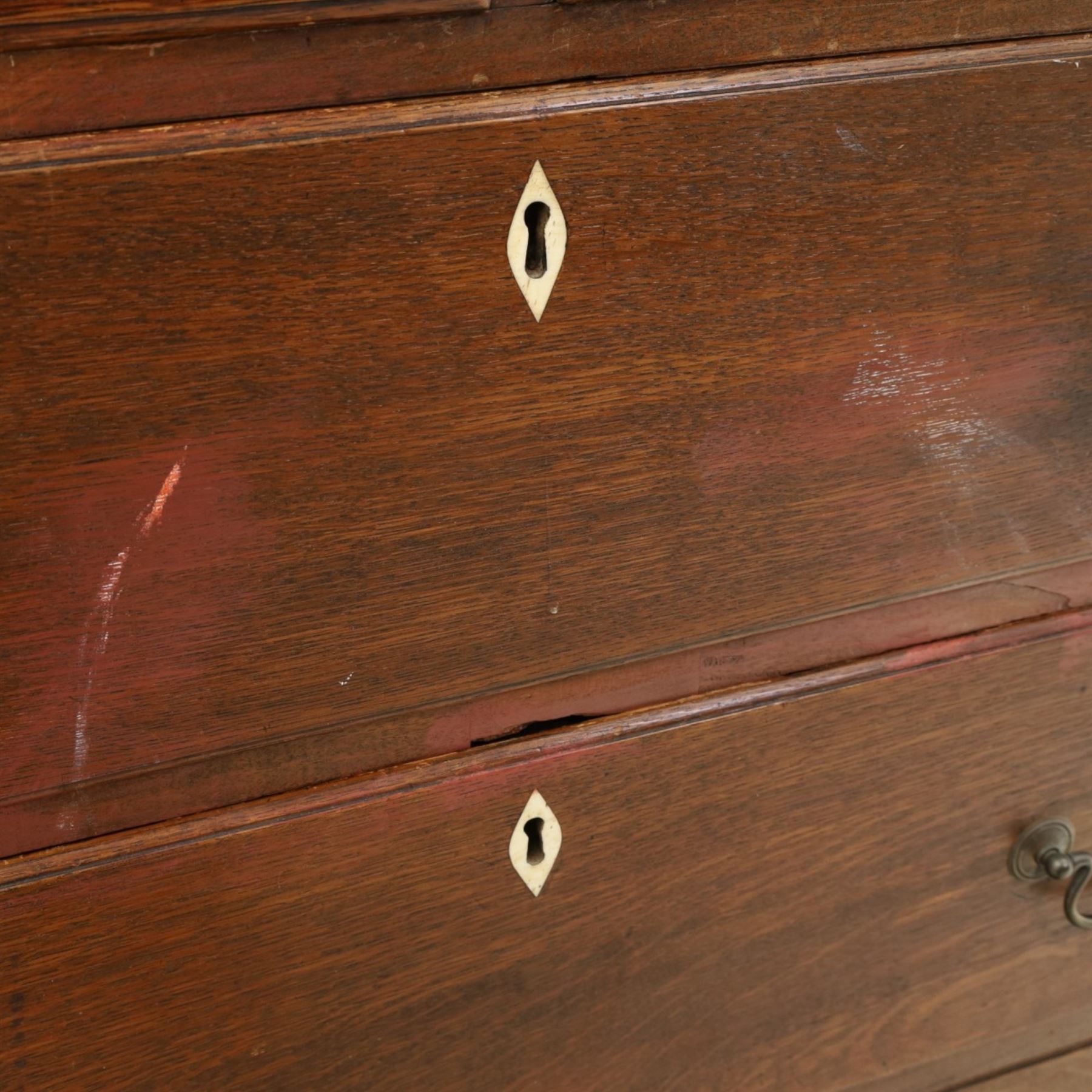 18th century oak chest, fitted with two short and three long graduating drawers, bone escutcheons and brass swan neck handles, bracket feet