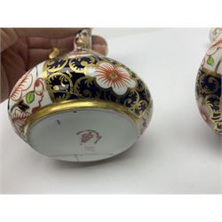 Pair of Royal Crown Derby 6299 imari pattern miniature vases, together with a miniature pitcher and dish in 2451 imari pattern, all with printed marks beneath, vase H12cm 
