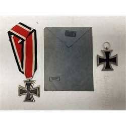 WW2 German Iron Cross 2nd Class with ribbon, ring stamped 44; and original issue packet; together with a copy of a WW2 Iron Cross